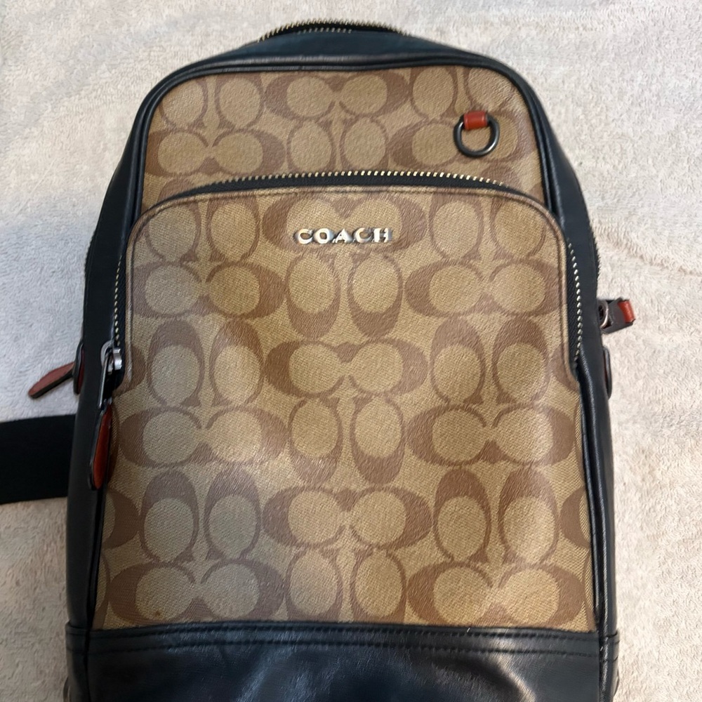 Coach Men's Signature Canvas Sling Bag in Brown with Black Trim